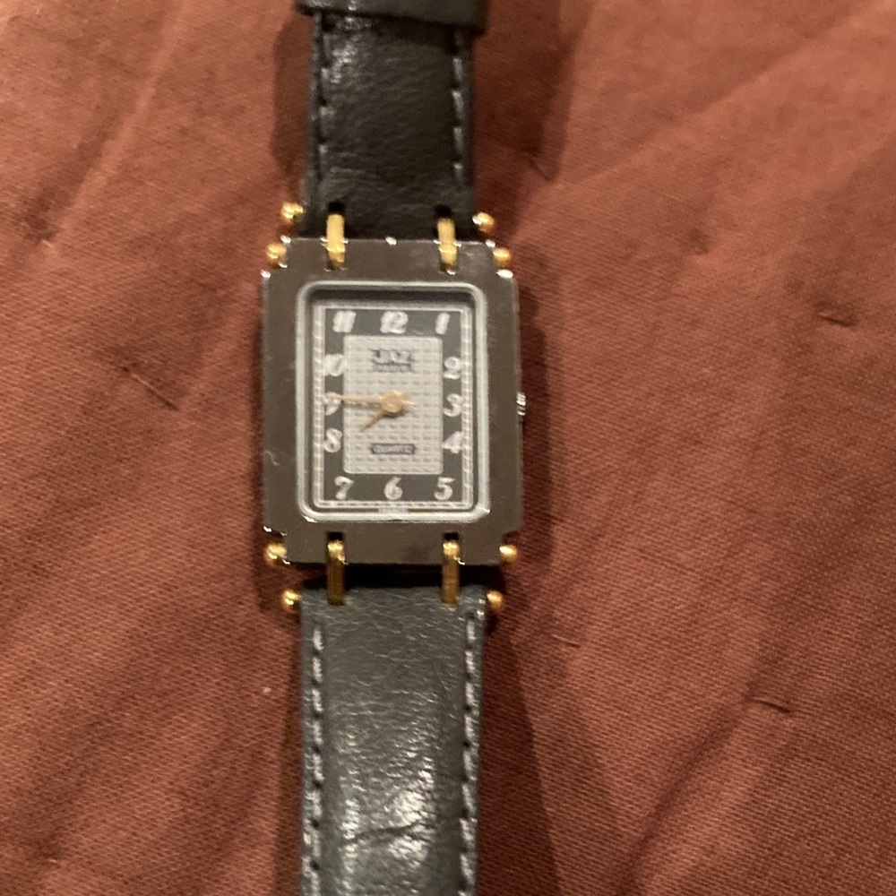 Gray Black and Gold trim watch